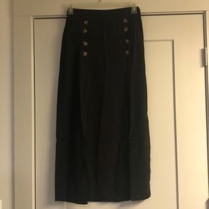 Black midi skirt with button detail